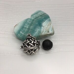 Pattern Aromatherapy Silver tone Locket.  Lava stone included.